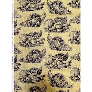 May include: Fabric with a repeating pattern of cornucopias, pumpkins, and other harvest elements in shades of brown on a yellow background. The fabric has a textured appearance. The text "CP46620 Comicopia, Springs Creative Products Group, LLC. 2013. Do not use for children's sleepwear." is printed on the left side.