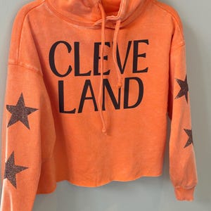Browns crop Hoodie; Cleveland Browns cropsweatshirt; Star sleeve hoodie; Cleveland Hoodie; Ladies Browns Sweatshit; Cleveland Browns apparel