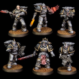 May include: Six miniature figurines of armored warriors in a dark gray and gold color scheme. Each figure is posed on a circular base, with various weapons and battle-ready stances. The figures are detailed with intricate designs.