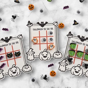 May include: Halloween Tic Tac Toe game boards with themed game pieces. The boards feature bats, pumpkins, and ghosts. The game pieces include cats, ghosts, Frankenstein's monster, and eyeballs. The game boards are surrounded by Halloween-themed decorations.