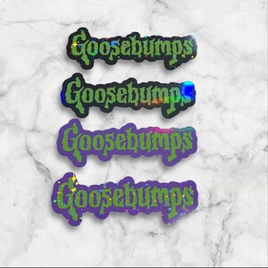 May include: Four rectangular stickers featuring the word Goosebumps in a stylized green font. The top and bottom stickers have a holographic finish with small star accents, while the middle two stickers feature solid green lettering on dark backgrounds.