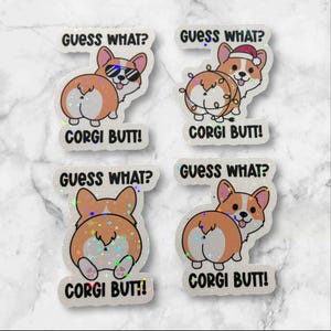May include: Four iridescent holographic stickers featuring a cartoon corgi with the text "Guess What? Corgi Butt!" printed on each sticker.