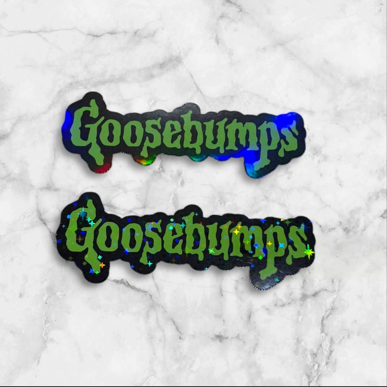 May include: Two die-cut stickers featuring the word Goosebumps written in a stylized, dripping green font. The stickers have a dark, holographic background that reflects light with small, colorful star-shaped sparkles across the surface.