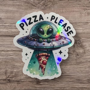 May include: A holographic sticker featuring an alien in a spaceship with the words "PIZZA PLEASE". The alien is green with large black eyes, and the spaceship is gray and blue. A slice of pizza is suspended below the spaceship.