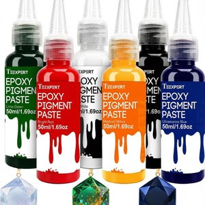May include: Six squeeze bottles of Teexpert epoxy pigment paste in lime green, bright red, white, medium yellow, black, and ultramarine blue. Each bottle contains 50ml/1.69oz of pigment. Three geometric resin shapes are displayed below the bottles.