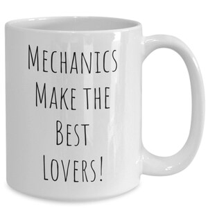 May include: White ceramic mug with a curved handle. The mug features the text "Mechanics Make The Best Lovers!" in black, bold, uppercase letters. The mug is designed for hot beverages.