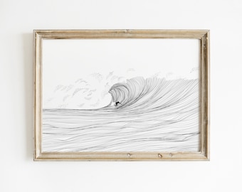May include: A black and white line art print of a surfer riding a wave. The wave is drawn with many lines, creating a sense of movement and energy. The print is framed in a light wood frame.