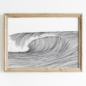 May include: A black and white line drawing of a wave crashing in the ocean. The wave is drawn with many thin lines that create a sense of movement and energy. The drawing is framed in a light wood frame.