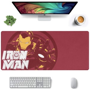 May include: Red and yellow graphic design of Iron Man's face and hand with the text "IRON MAN" on a red mouse mat.