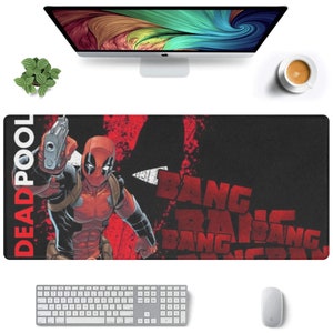 May include: A black and red mousepad with a graphic of Deadpool holding a gun and the text "DEADPOOL" and "BANG BANG BANG".