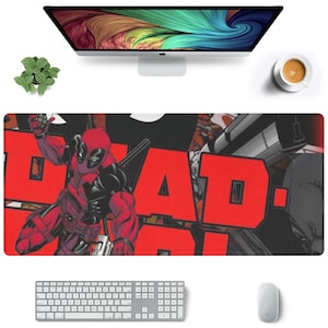 May include: A black and red Deadpool themed desk mat with the word "DEAD-POOL" in large red letters. The character Deadpool is depicted in a fighting pose.