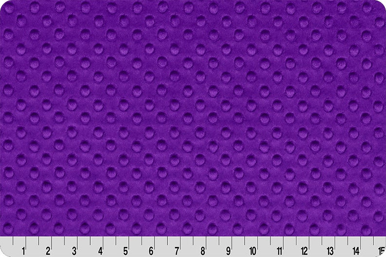 May include: Purple minky fabric with a textured dot pattern.