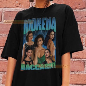 May include: Black t-shirt with a vintage-style graphic featuring four women and the text "MORENA BACCARIN".