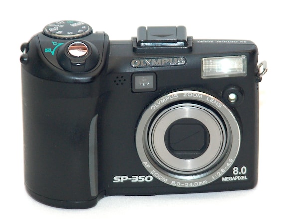 Olympus SP-350 8.0m.p Digital Camera in Very Good Condition With 