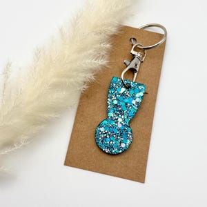Einkaufswagenlöser Blau mit Glitzer aus Epoxidharz