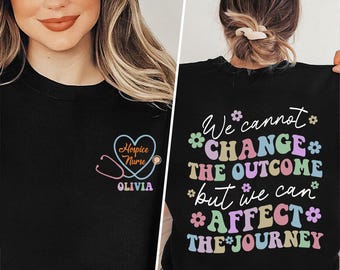 May include: Black t-shirt with a stethoscope and heart design that says "Hospice Nurse" and "Olivia". The text on the back of the shirt says "We cannot *CHANGE* THE OUTCOME but we can *AFFECT* THE JOURNEY".