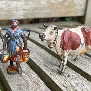 Antique Hand Painted Diecast Metal/Lead scale models of a cow and milkmaid by Johillco