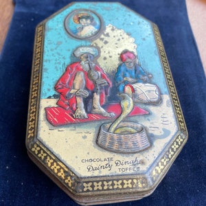 Vintage Dainty Dinah Chocolate Toffee Tin made by George Horner featuring Snake Charmer