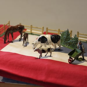 A Collection of Antique Hand Painted Diecast Metal/Lead Farmyard Animals, Figures and Accessories by FG Taylor and sons, Timpo and Britains