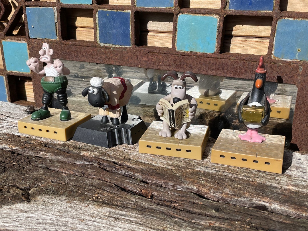 A Collection of Wallace and Gromit Figurines Wallace, Gromit, Sean and
