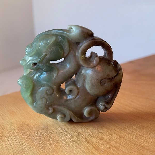 A Chinese Russet Jade Bi Disc 5.5cm Across