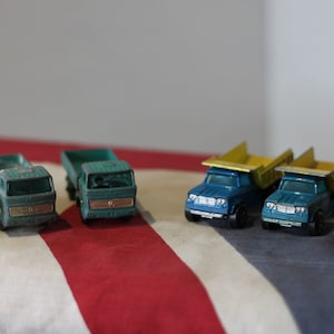 Matchbox toys - Five Diecast Metal Matchbox Series Toy Trucks and One Trailer By Lesney 1960's