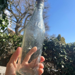 Vintage originele R. witte &#39;westerse&#39; glazen fles met originele stop c1900