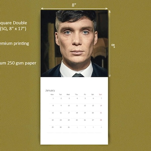 May include: A wall calendar featuring a portrait of a man in a suit on the top half and a January grid on the bottom half. The calendar is labeled Square Double, 8 inches by 17 inches, premium printing, and premium 250 gsm paper.