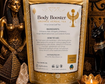 May include: A gold-coloured pouch of Body Booster Organic Herbal Tea containing 1.4 oz of loose leaf tea. The label lists ingredients including Echinacea, Basil, Astragalus, Elderberry, Ginger, Marshmallow root, Licorice blend, and Hyssop with instructions.