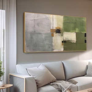 Peut inclure: Peinture à l'huile abstraite sur toile avec un cadre doré. L'œuvre présente une surface texturée avec une palette de couleurs grise, verte et beige. La composition est divisée en formes géométriques, créant une esthétique moderne.