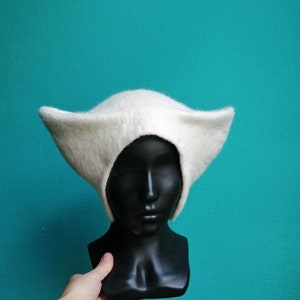felted historical medieval women's woolen horned royal hat of the reenactor, theatrical cap, noble women's hat of the XIII-XV centuries
