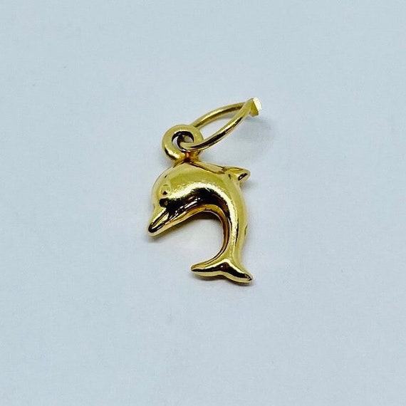 Gold Tiny Dolphin Charm - image 1