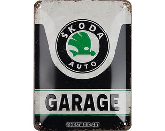 May include: A black and white metal sign with a green Skoda logo and the text "SKODA AUTO GARAGE" in white. The sign has a distressed, vintage look and the copyright text "©NOSTALGIC-ART" is at the bottom.