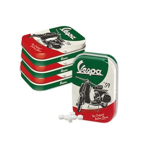 May include: A stack of four green, red and white metal tins featuring a Vespa scooter graphic and the text "Vespa '59 The Original Italian Classic". The tins are filled with white round mints.