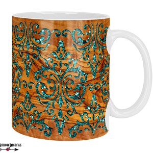 Puede incluir: Taza de cer&aacute;mica blanca con un dise&ntilde;o de veta de madera y un patr&oacute;n de purpurina turquesa. La taza tiene un asa en el lado derecho.