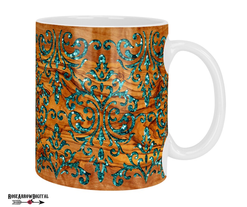 Puede incluir: Taza de cer&aacute;mica blanca con un dise&ntilde;o de veta de madera y un patr&oacute;n de purpurina turquesa. La taza tiene un asa en el lado derecho.