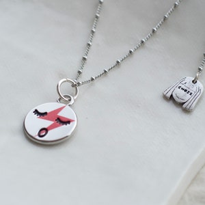 Red Lightning bolt face pendant necklace in silver (white gold tone) tone