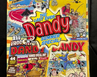 May include: The Dandy Summer Special comic book cover features a colourful illustration of characters on a beach. The cover text reads "The Last Ever Dandy Summer Special!" and "Free Dandy Summer Special 2007".