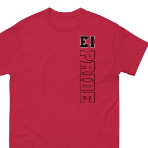 May include: A red t-shirt with the text "EI PRIDE" printed vertically in black block letters. The shirt is a short-sleeved, crew neck style, and the text is positioned on the left side of the shirt.
