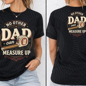 May include: A black short-sleeve t-shirt featuring a graphic design with a tape measure illustration and the text "NO OTHER DAD CAN MEASURE UP". The design is printed on the front and back, showcasing a vintage-inspired circular emblem.