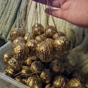 Whole golden walnuts with golden thread string Christmas tree Christmas decorations Winter Christmas decoration crafts gifts