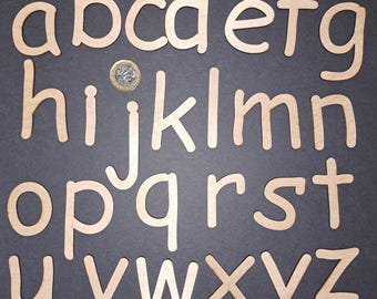 Wooden Letters of the alphabet - Lower and Upper Case - Roughly 40mm to 60mm, width varies - 3mm thick