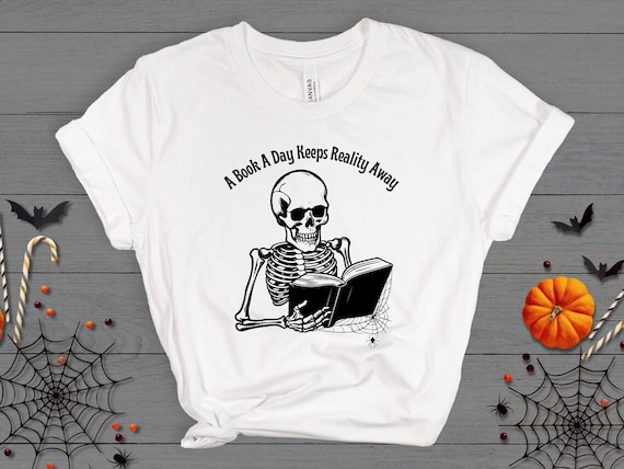 A Book a Day Keeps Reality Away T-Shirt - Skeleton Reading Tee - Spooky Book Shirt - Dark Academia T-Shirt - Funny Book Lover Gift