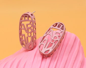 Pink Oval Earrings with Word Davai in Russian, Colorful and Quirky