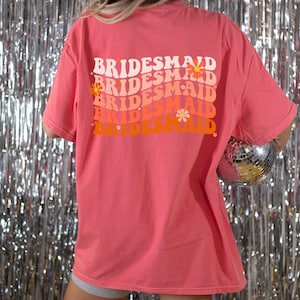 Comfort Colors bridesmaid bachelorette party t shirt pink orange groovy retro disco flowers wavy