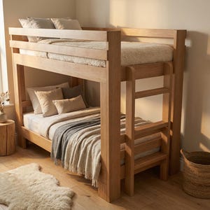 May include: A light-colored wooden bunk bed with a ladder, featuring two beds with beige bedding and pillows. The room has a window, a small wooden side table, and a woven basket. A fluffy rug is on the floor.