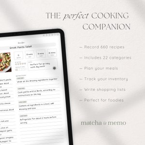 May include: A white digital planner with a recipe for Greek pasta salad on the screen. The planner has a black border and the text "THE perfect COOKING COMPANION" at the top. The recipe includes instructions for preparing the salad, with a note that it is "Perfect for an easy work day lunch!"