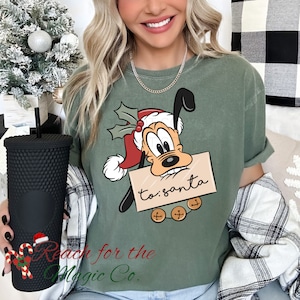 Camiseta gráfica Plutão Cartas para o Papai Noel Comfort Colors