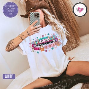 in my showgirl era bracelet shirt tswiftie inspired tee colorful fan girl gift eras tour t shirt 12 era pop culture music tee showgirl beaded stack shirt friendship bracelet graphic tee for concert colorful shirt for music lover eras fandom shirt taylor hoodie, kids taylor hoodie, youth sweatshirt, girls sweatshirt, toddler sweatshirt, youth crewneck, taylor apparel, taylor girls clothes, showgirl hoodie, kids showgirl shirt, youth showgirl tee, girls taylor shirt, showgirl costume