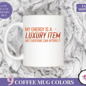 swifty ts12 taylor coffee mug expensive energy mug for women tswiftie fan cup my energy is a luxury item orange faux glitter mug self love quote mug funny taylor mug fan girl gift for her coffee lover mug gift for taylor fan showgirl era aesthetic mug pop culture coffee cup fandom gift bold quote mug comfort colors style mug iced coffee gift for fan ts12 inspired mug taylor culture merch christmas mug funny gift for friend motivational mug orange mug for her